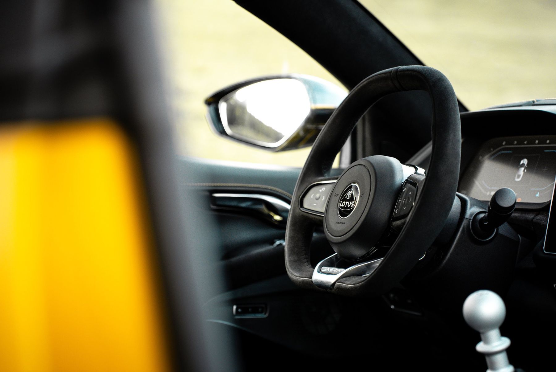 Cockpit and steering wheel of the Lotus Emira